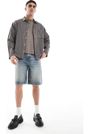 ASOS Pantalones cortos vaqueros de corte alargado con tintado de