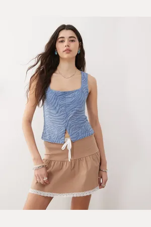 Reclaimed Camiseta de tirantes con estampado de cebra flocado y abertura delantera de