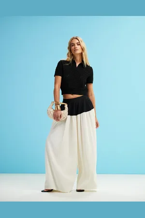 ASOS Pantalones de sastre negros y blancos extragrandes con panel en contraste de mezcla de tejidos de