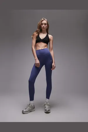 New Balance Leggings azules de talle alto de