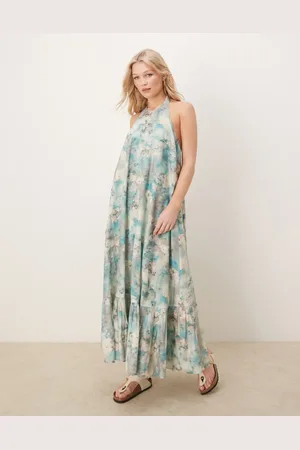 ASOS Vestido largo de cuello halter con estampado floral difuminado y bajo de volante de -Multicolor