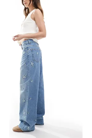 ASOS Vaqueros dad de pernera ancha con bordado floral de
