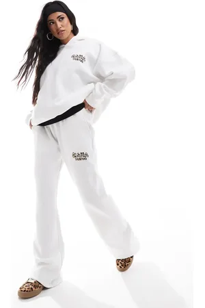 Kaiia Joggers color de pernera ancha con logo con fondo de leopardo exclusivos de (parte de un conjunto)-Blanco