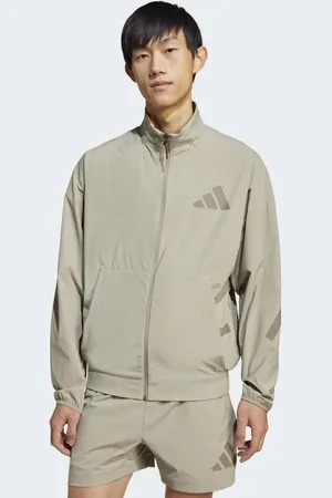 adidas Chaqueta de chándal beis masilla de tejido liso adidas Z.N.E. de -Gris