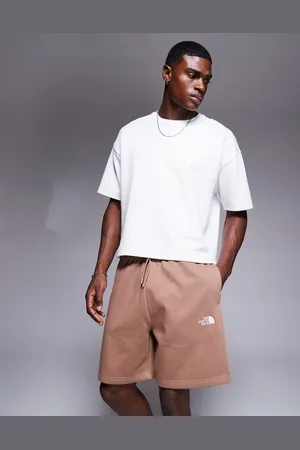 The North Face Pantalones cortos de chándal marrones básicos con logo Essential de