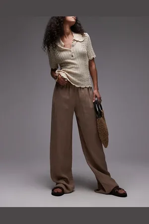 MANGO Pantalones de pernera recta con cintura elástica de tejido efecto rugoso de -Neutro