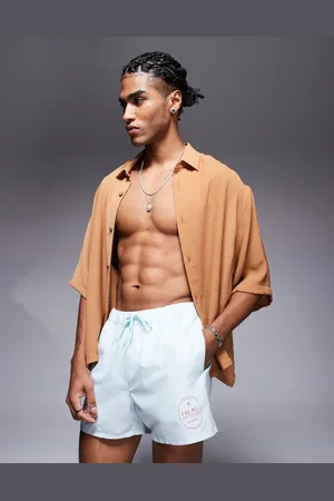 ASOS Shorts de baño cortos a rayas azules y blancas de