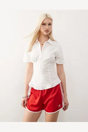 COLLUSION Camisa con cintura ceñida de