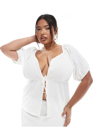 Esmée Top playero con lazada delantera y mangas abullonadas exclusivo de