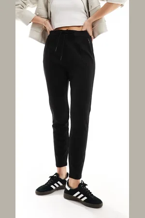 VERO MODA Pantalones negros de corte tapered y lazada en la cintura de punto liso de