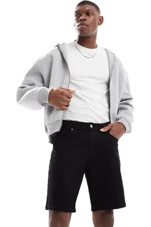 ASOS Pantalones cortos vaqueros negros entallados de largo estándar de