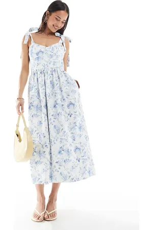 French Connection Vestido midi color crema con estampado floral azul y tirantes anudados de