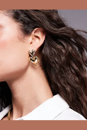 Kaiia Pendientes dorados con diseño de corazón doble exclusivos de