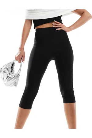 Kaiia Pantalones capri negros ceñidos exclusivos de