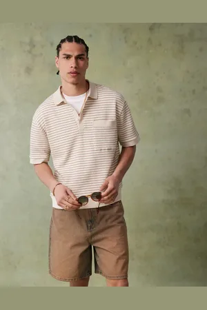 ASOS Polo blanco y marrón a rayas texturizadas de corte cuadrado holgado de