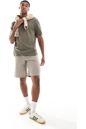 River Island Camiseta caqui a rayas Studio de