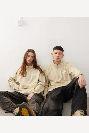 The North Face Anorak blanco hueso plegable con cremallera corta Kecha exclusivo en ASOS de