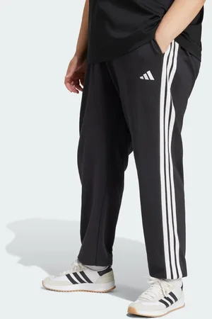 adidas Pantalones negros y blancos con 3 rayas y bajos ajustados de felpa rizada Essentials de