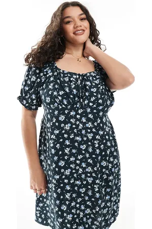 New Look Vestido corto azul a cuadros vichy de estilo mesonera con estampado floral de New Look Curve