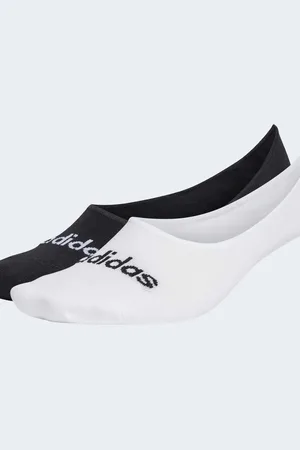 adidas Pack de 2 pares de calcetines invisibles de color blanco y negro con logo lineal Think Linear de