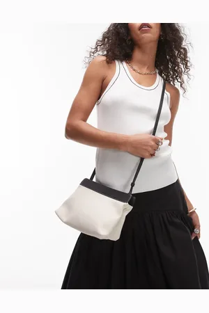 ARKET Bandolera pequeña beis claro neutro con detalles negros en contraste de cuero de
