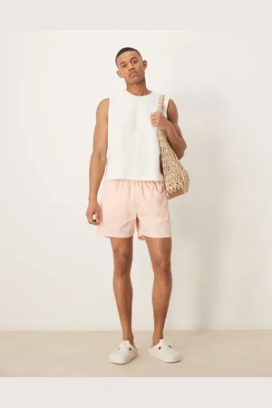 Calvin Klein Shorts de baño rosa melocotón con logo y cordón ajustable de