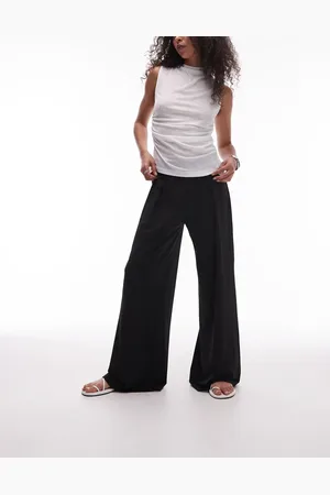 MANGO Pantalones negros elásticos de pernera ancha con cinturilla elástica de