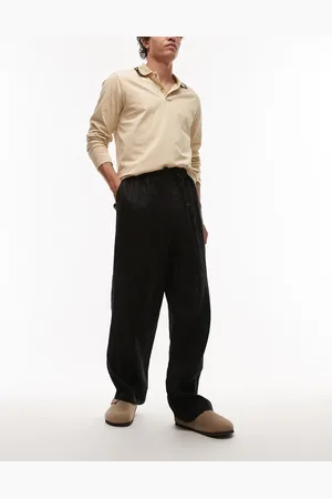 ARKET Pantalones negros holgados con cordón ajustable de lino de