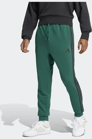 adidas Pantalones verde universitario y negros básicos con detalle de 3 rayas de felpa de rizo de