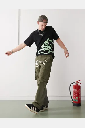 ICECREAM Pantalones caquis cargo con diseño convertible con cremallera Running Dog de -Verde