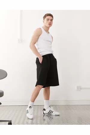 Weekday Pantalones cortos negros de tejido efecto neopreno Simon de