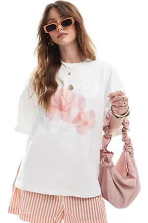 The Frolic Camiseta blanca extragrande con estampado de flores de hibisco exclusiva de