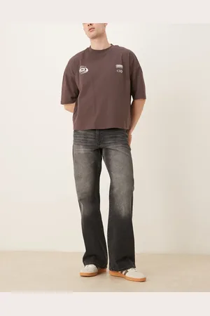 ASOS Vaqueros de corte acampanado ancho con lavado negro vintage de