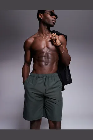 ASOS Shorts de baño verdes de corte alargado de