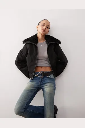 Weekday Chaqueta negra con cuello de piel sintética Hiro de