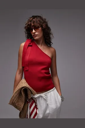 MANGO Top asimétrico con detalle de lazada de punto de