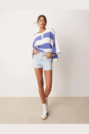 Free People Pantalones cortos vaqueros de talle medio Tippie de
