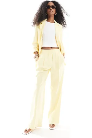 VERO MODA Pantalones amarillo pastel de pernera ancha Mix & Match de (parte de un conjunto)
