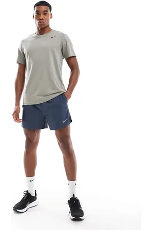 Nike Pantalones cortos azul marino de 5 pulg. con diseño 2 en 1 Challenger Dri-FIT de