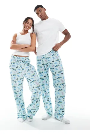ASOS Pantalones de pijama azules con estampado gráfico "Pizza Planet" de "Toy Story" de Disney de