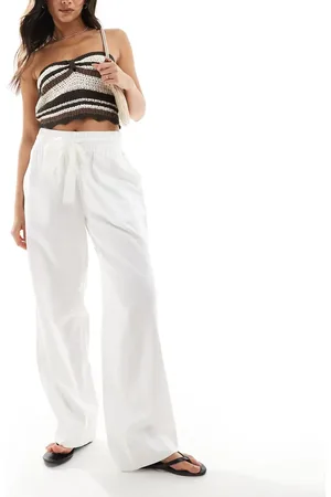 French Connection Pantalones blancos de pernera ancha con lazada en la cintura de