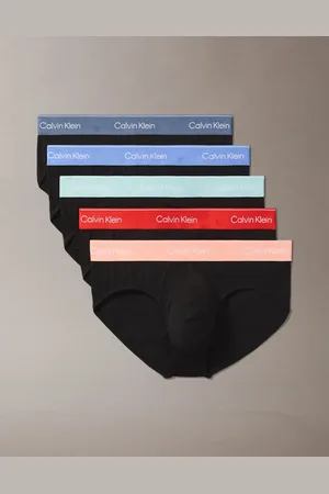 Calvin Klein Pack de 3 calzoncillos slip de color con cinturillas rojas y azules Icon Cotton Stretch de