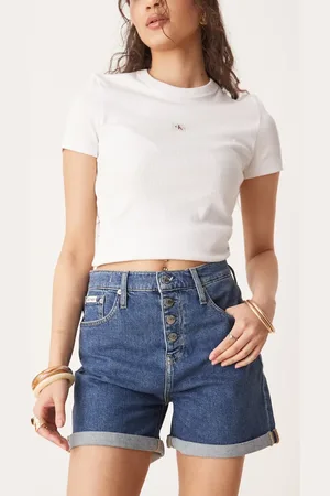 Calvin Klein Pantalones cortos mom con lavado oscuro y bajos vueltos de -Azul