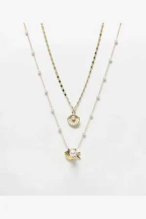 Kaiia Pack de 2 collares dorados con detalle de perlas y conchas de