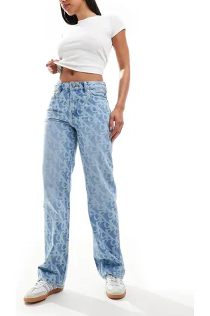 Calvin Klein Vaqueros azul medio con estampado integral de estilo años 90 Signature de
