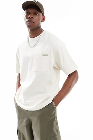 Calvin Klein Camiseta blanco hueso holgada con bolsillo de punto liso grueso de