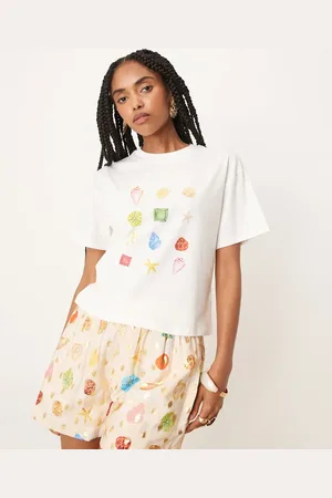 Never Fully Dressed Camiseta blanca con estampado de conchas multicolores de (parte de un conjunto)