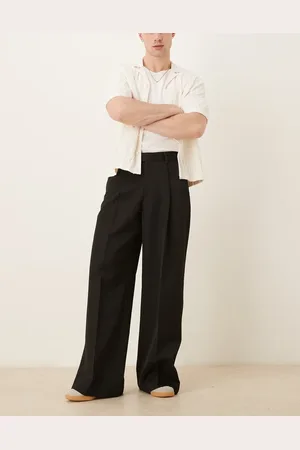 ASOS Pantalones de vestir negros de corte suelto con pinzas delanteras de