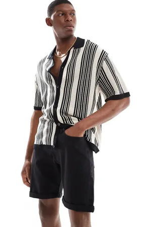 JJ Pantalones cortos vaqueros negros con bajos vueltos de
