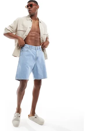 JJ Pantalones cortos vaqueros azules sueltos de corte claro de
